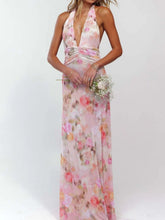 Floral halter neck deep V maxi dress with tied, ruched, backless design in lightweight polyester