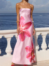 Printed tube maxi dress made of 100% polyester with basic style and no stretch, available in multiple sizes.
