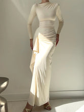 Black ruched long sleeve maxi dress with side slit and tie detail