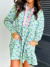 Printed long sleeve shirt dress with buttoned front and no stretch, made from 100% polyester.
