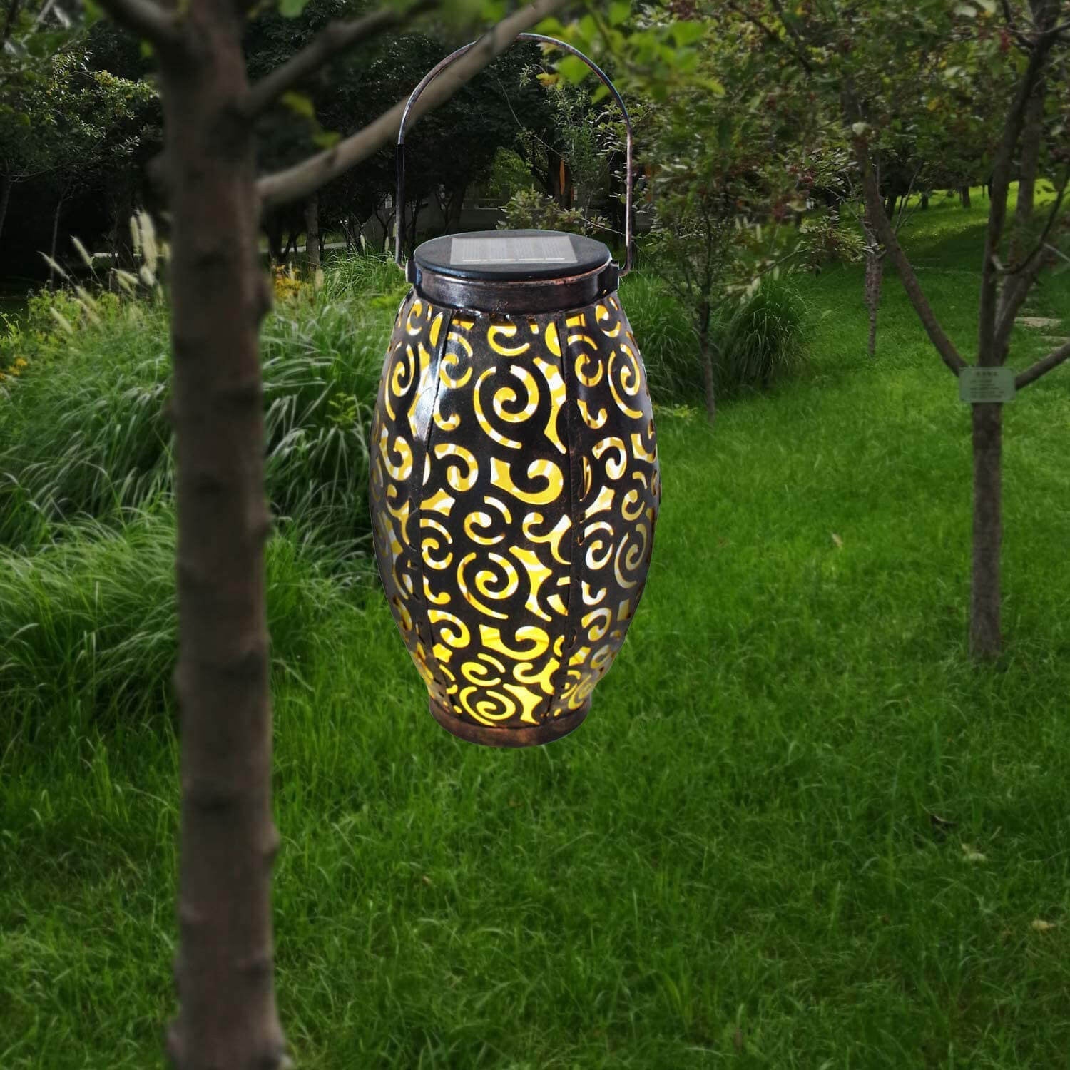 Lámpara LED decorativa para césped con diseño de patrón hueco de hierro solar para colgar 