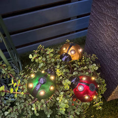 Lampe décorative d'extérieur en fer à LED coccinelle solaire 