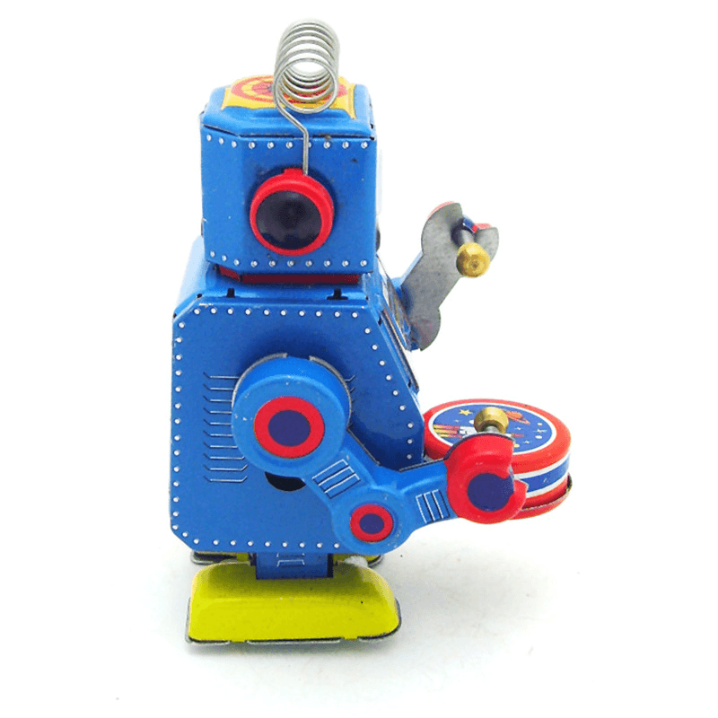 Clásico robot de cuerda vintage con mecanismo de relojería para niños, juguete de hojalata con llave