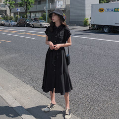 Vestido camisero con cola de pez de la francesa Hepburn