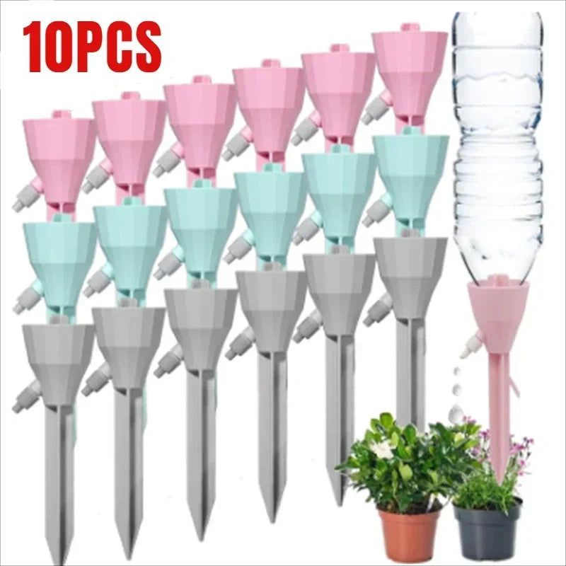 Bottle drip watering spike in a plant pot