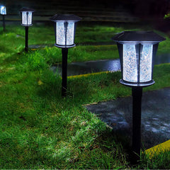 Luces LED solares LANSGARINE para jardín al aire libre, estacas (vidrio), resistentes al agua (paquete de 12)