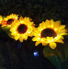 2 luces LED de jardín con forma de girasol