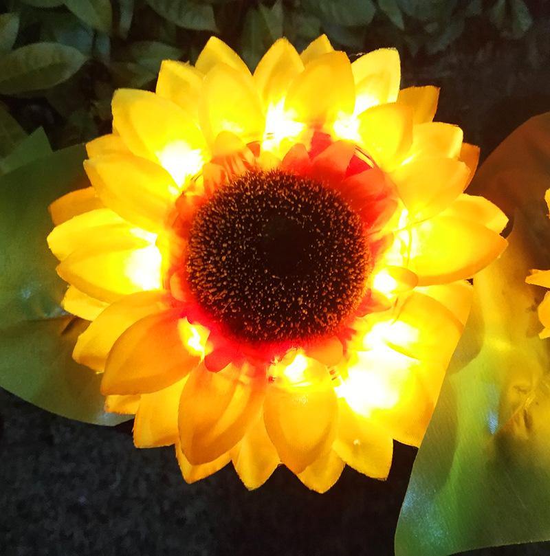 2 luces LED de jardín con forma de girasol