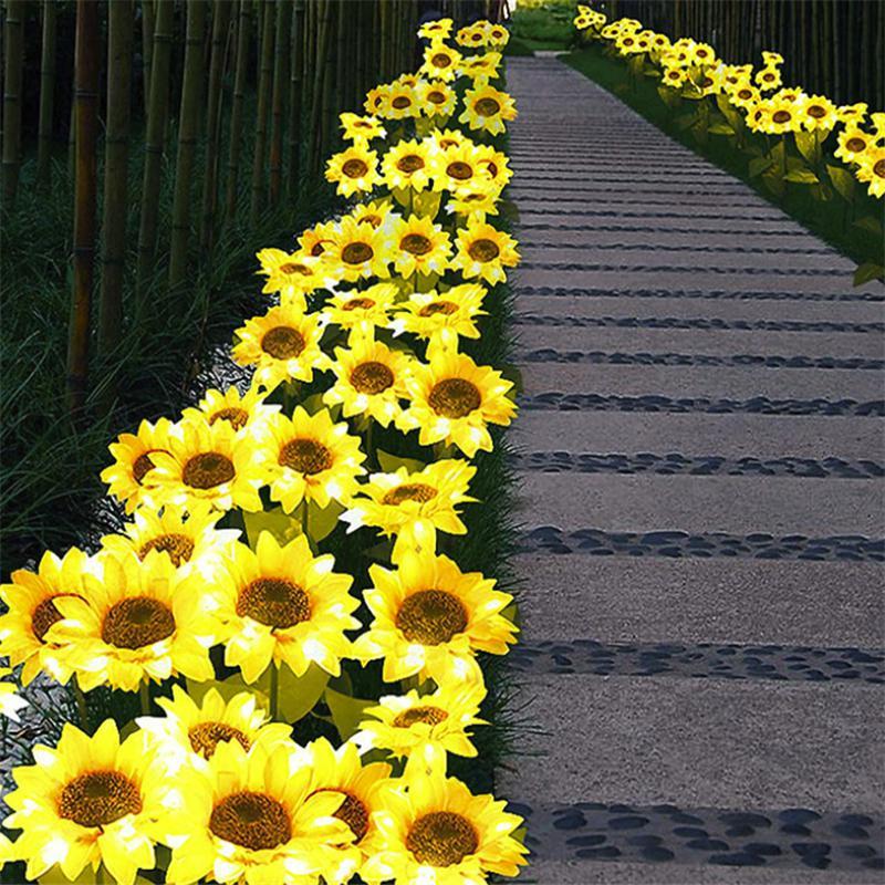 2 luces LED de jardín con forma de girasol