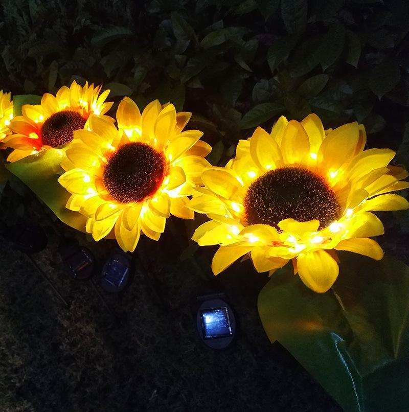 2 luces LED de jardín con forma de girasol